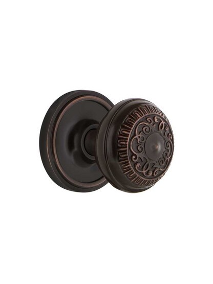 Classic Rosette Mortise Lock Set With Egg and Dart Door Knobs in Timeless Bronze.